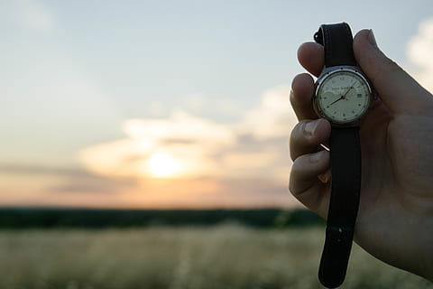 watch, time, hands, human hand, hand, one person, sky, human body part, holding, cloud - sky, real people, wristwatch, nature, sunset, body part, unrecognizable person, finger, human finger, leisure activity, focus on foreground, outdoors, clock, 5K, CC0, public domain, royalty free