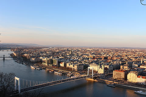 budapest, hungary, danube, bridge, city, sky, blue, water, buildings, architecture, building exterior, built structure, cityscape, river, connection, nature, transportation, no people, bridge - man made structure, travel destinations, building, residential district, high angle view, outdoors, chain bridge, skyscraper, 5K, CC0, public domain, royalty free