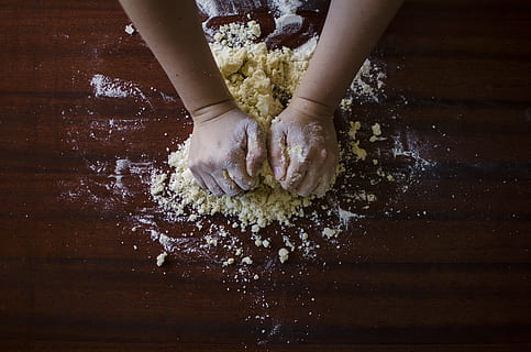 person mixing dough, baker, bakery, baking, bread, dough, flour, knead, pastry, royalty  images, human body part, food and drink, food, one person, human hand, wood - material, indoors, hand, body part, table, lifestyles, freshness, preparation, preparing food, real people, making, midsection, kneading, finger, human foot, human limb, 4K, CC0, public domain, royalty free