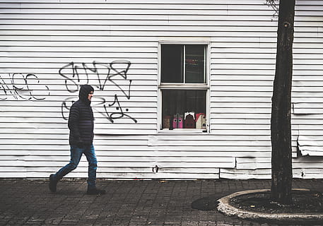 man, window, graffiti, tree, urban, street, full length, architecture, one person, real people, building exterior, built structure, day, shutter, standing, building, lifestyles, side view, closed, outdoors, leisure activity, entrance, men, door, iron, 2K, CC0, public domain, royalty free