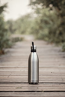 vacuum flask, brown, wooden, dock, bottle, container, macro, path, tumbler, wood - material, tree, plant, focus on foreground, day, direction, the way forward, nature, no people, outdoors, footpath, empty, single object, vanishing point, food and drink, diminishing perspective, table, close-up, long, 5K, CC0, public domain, royalty free