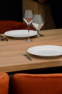 table, dining room, presentation, interior, meals, cutlery, contemporary, available, eating utensil, plate, fork, glass, kitchen utensil, wineglass, empty, indoors, setting, household equipment, place setting, no people, food and drink, absence, restaurant, furniture, spoon, drinking glass, still life, table knife, empty plate, dining, 2K, CC0, public domain, royalty free