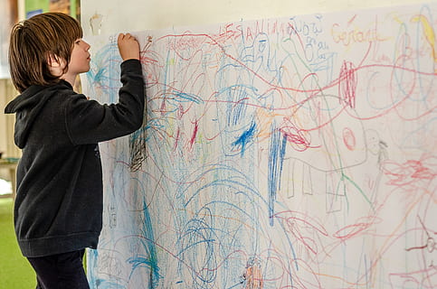 child, draw, scribbles, cute, childhood, fun, boy, creative, one person, standing, real people, map, looking, lifestyles, waist up, women, leisure activity, three quarter length, indoors, art and craft, casual clothing, adult, rear view, men, activity, teenager, searching, 4K, CC0, public domain, royalty free
