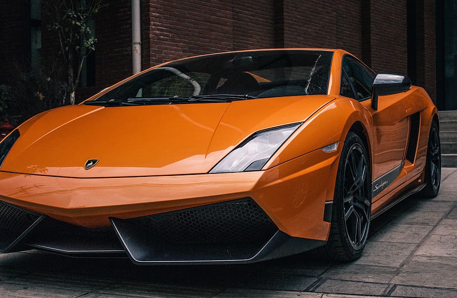 vista laterale, arancia, lamborghini, fari del proiettore, cerchi in lega, avventura, motore, davanti, griglia, il motore, lato, velocità, vista, ruota, lega, alluminio, auto, automatico, cambio automatico, trasmissione automatica, automobile, settore automobilistico, corpo, cofano, freno, muro di mattoni, carbonio, cruscotto, design, veloce, Leva del cambio, faro, idraulica, luci, lusso, metallo, motorizzato, all'aperto, energia, premio, auto sportiva, tecnologia, trasporto, mezzi di trasporto, veicolo, sfogo, ruote, modo di trasporto, veicolo a motore, colore arancione, nessuno, veicolo terrestre, città, Taxi, architettura, portiera della macchina, strada, stazionario, giallo, giorno, esterno dell'edificio, in stile retrò, box auto, 2K