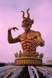 funfair, devil, carrousel, sculpture, statue, representation, art and craft, human representation, sky, architecture, built structure, creativity, religion, male likeness, belief, spirituality, nature, no people, craft, travel destinations, building, building exterior, outdoors, 4K, CC0, public domain, royalty free