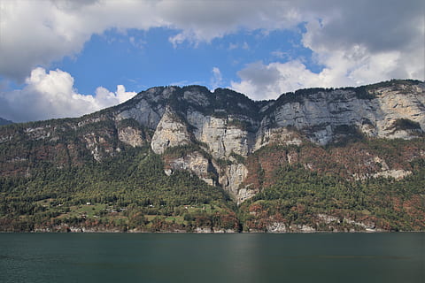 the alps, high, array, tops, mountains, rocks, lake, alpine, the height of the, the environment, panorama, scenery, water, reflection, clouds, natural, landscape, mountain, the stage, travel, stone, beach, morning, far view, sky, cloud - sky, nature, beauty in nature, scenics - nature, environment, waterfront, no people, tranquility, tranquil scene, day, sea, land, outdoors, formation, view into land, 5K, CC0, public domain, royalty free
