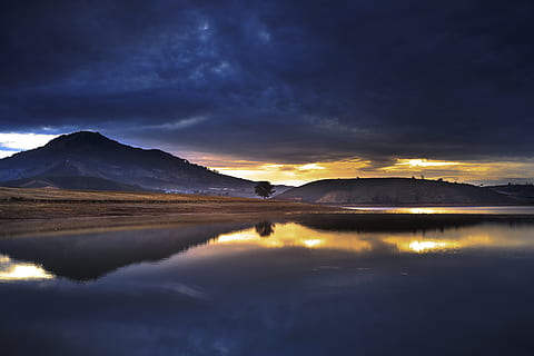 mountain view, seen, across, calm, river, dawning, beach, clouds, cloudscape, dawn, dusk, evening, horizon, lake, landscape, mountain, nature, ocean, outdoors, reflection, scenic, sea, silhouette, sky, skyscape, sunrise, sunset, travel, tree, water, cloud - sky, beauty in nature, scenics - nature, tranquility, tranquil scene, mountain range, idyllic, non-urban scene, one person, mountain peak, 5K, CC0, public domain, royalty free