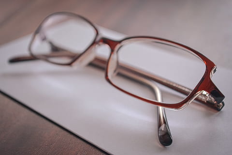 eyeglasses on paper, close-up, eyeglasses, eyewear, vision, glasses, eyesight, indoors, no people, single object, table, fashion, healthcare and medicine, personal accessory, sensory perception, studio shot, reading glasses, simplicity, eye test equipment, lens - eye, still life, close to, 4K, CC0, public domain, royalty free