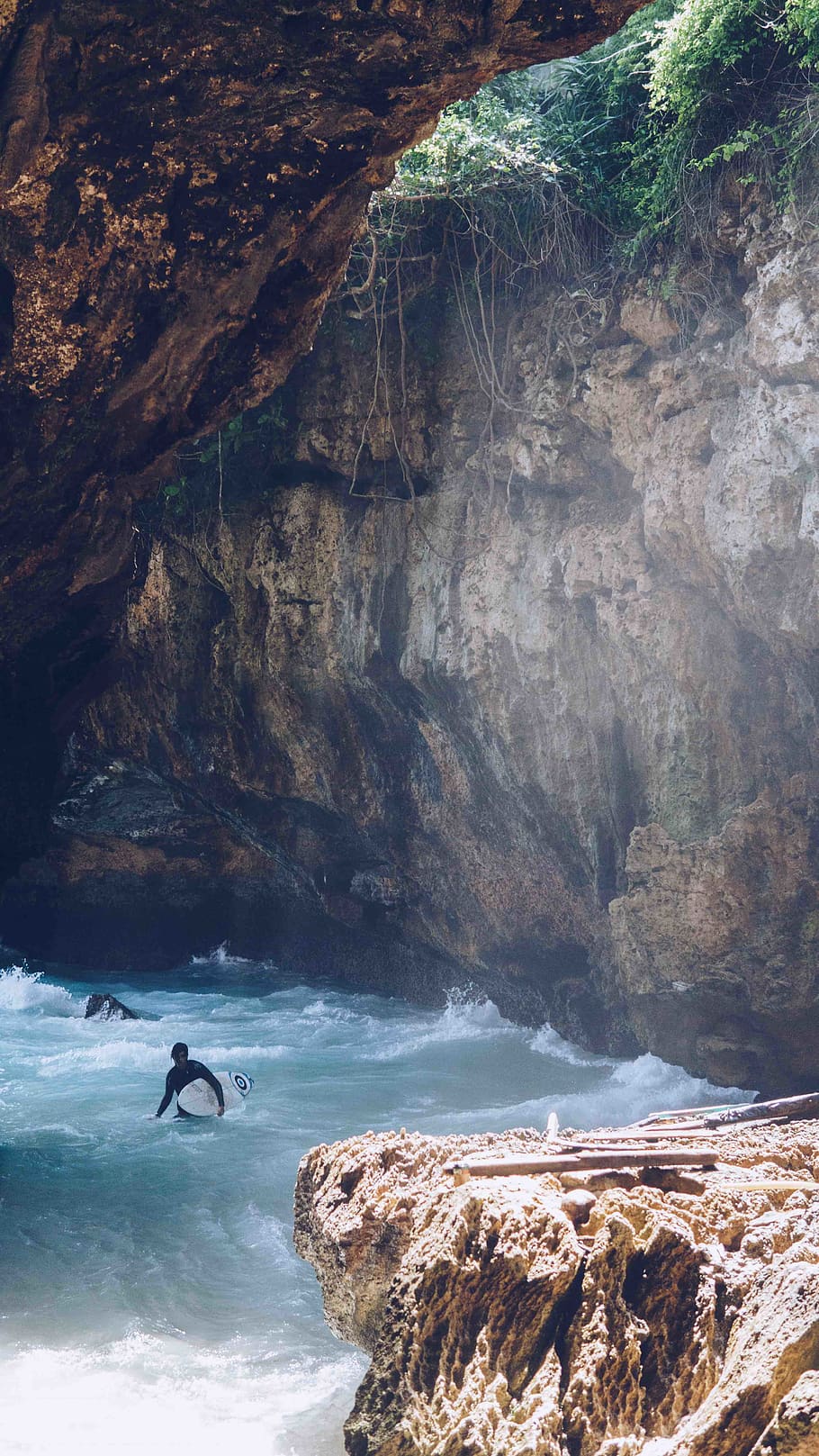 cave, beach, hidden, surfer, water, rock, rock - object, sea, rock formation, solid, adventure, beauty in nature, day, cliff, nature, scenics - nature, real people, sport, leisure activity, people, lifestyles, tranquility, land, outdoors, 5K