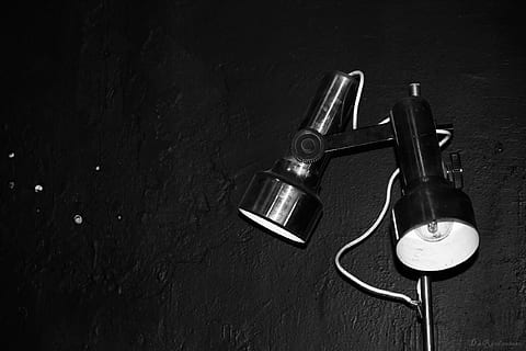 lamp, indoors, still life, music, arts culture and entertainment, table, no people, technology, close-up, high angle view, communication, musical instrument, listening, connection, metal, equipment, audio equipment, headphones, black color, wood - material, 2K, CC0, public domain, royalty free