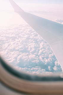 white, clouds, daytime, transportation, vehicle, aircraft, airplane, window, outdoors, nature, flight, sky, porthole, sphere, azure sky, airliner, leisure activities, adventure, cloud, weather, cumulus, bird, flying, cloud - sky, air vehicle, no people, mode of transportation, beauty in nature, scenics - nature, aircraft wing, cloudscape, day, motion, mid-air, travel, on the move, 5K, CC0, public domain, royalty free