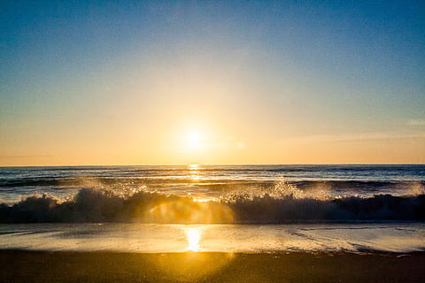 sunset, sun rays, beach, sand, ocean, sea, shore, waves, horizon, summer, sky, water, scenics - nature, beauty in nature, tranquility, horizon over water, land, tranquil scene, sunlight, wave, motion, idyllic, reflection, sun, nature, no people, outdoors, lens flare, bright, 4K, CC0, public domain, royalty free