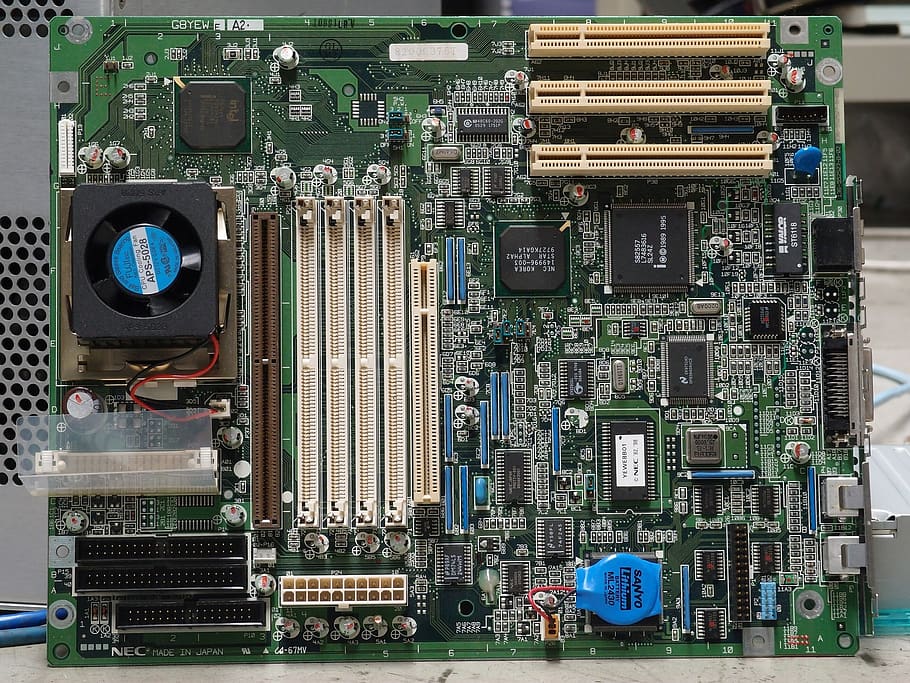 grønt bundkort, batteri, brædder, chip, chips, kredsløb, CMOS, komponenter, kondensator, stik, cpu, dioder, elektricitet, elektronik, element, ventilator, hardware, industri, hukommelse, mikro, mikroprocessor, bundkort, havne, vædder, modstand, halvleder, silicium, spillemaskiner, fatning, opbevaring, teknologi, transistor, bygning udvendig, bygget struktur, forbindelse, arkitektur, ingen mennesker, by, høj vinkel visning, udendørs, dag, transportmidler, computerchip, kompleksitet, moderne, kredsløbsplade, elektronikindustrien, bybilledet, brændstof og elproduktion, meddelelse, 1080P