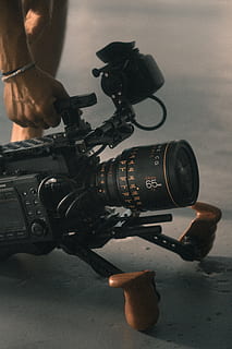 person, holding, video camera, stablizer, camera, hand, orion, video, cinematography, videography, cinema camera, anamorphic, camera len, canon, gear, tech, black, video shoot, film shoot, c700, anamorphic len, closeup, digital, camera - Photographic Equipment, equipment, lens - Optical Instrument, hobbies, photographer, technology, single Object, men, people, sLR Camera, close-up, no People, photography Themes, black Color, 5K, CC0, public domain, royalty free