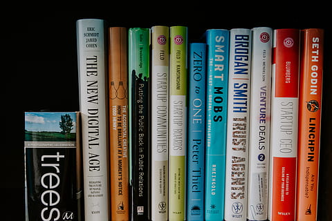 assorted book lot, text, number, no people, western script, indoors, finance, close-up, order, multi colored, studio shot, arrangement, communication, book, large group of objects, in a row, publication, paper currency, black background, side by side, variation, 5K, CC0, public domain, royalty free