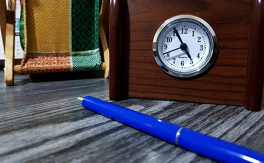 clock, pen, table, office, time, wood - material, number, no people, indoors, close-up, still life, blue, alarm clock, accuracy, focus on foreground, day, single object, selective focus, instrument of time, writing instrument, pencil, 4K, CC0, public domain, royalty free