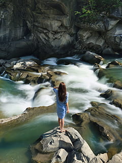 woman, blue, long-sleeved, dress, standing, middle, rock, raging, water, daylight, daytime, environment, flow, nature, outdoorchallenge, outdoors, person, rapids, river, rocks, scenic, timelapse, solid, rock - object, beauty in nature, leisure activity, one person, real people, lifestyles, long exposure, scenics - nature, waterfall, motion, full length, blurred motion, rock formation, flowing water, flowing, stream - flowing water, 4K, CC0, public domain, royalty free