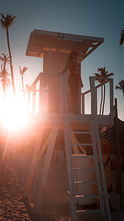 lys, flare, person, human, Dominikanske republik, bavaro strand, punta cana, sollys, himmel, solopgang, udendørs, natur, pige, strand, sunflair, Palmer, badedragt, rød badedragt, livredder station, livredder, solstråle, arkitektur, linseflare, solnedgang, sol, bygget struktur, dag, træ - materiale, jord, stige, ingen mennesker, lav vinkel visning, fritidsaktivitet, skyfri himmel, orange farve, 5K, CC0, offentligt domæne, royaltyfrie