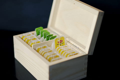 tea, box, chest, container, indoors, box - container, no people, studio shot, open, food, food and drink, black background, still life, cardboard, close-up, group of objects, high angle view, in a row, large group of objects, cardboard box, wellbeing, crate, packet, snack, 4K, CC0, public domain, royalty free