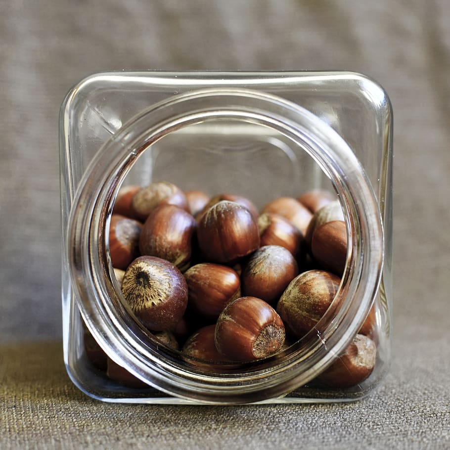 Nocciole, vaso, Marrone, Noce, noci marroni, snack salutare, vitamine, fonte, nutrizione, fitness, proteina, delizioso, vegano, vegetariano, nocciola, cibo, cibo e bevande, contenitore, freschezza, in casa, nessuno, benessere, mangiare sano, avvicinamento, grande gruppo di oggetti, natura morta, tavolo, vetro - materiale, dado - cibo, trasparente, vista dall'alto, concentrarsi sulle conoscenze acquisite, abbondanza, spuntino, 4K