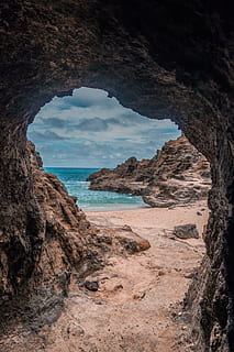 cave near sea, beach, cave, clouds, daylight, landscape, nature, ocean, rocks, sand, scenic, sea, seascape, seashore, sky, summer, turquoise, vacation, water, rock, rock - object, solid, land, rock formation, tranquility, no people, scenics - nature, tranquil scene, beauty in nature, horizon over water, cloud - sky, day, horizon, outdoors, eroded, 5K, CC0, public domain, royalty free