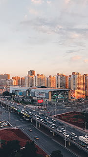 China, Harbin, buitenkant van het gebouw, stad, ingebouwde structuur, architectuur, hemel, vervoer, wolk - lucht, gebouw, weg, stadsgezicht, wijze van transport, hoge hoekmening, natuur, auto, straat, zonsondergang, motorvoertuig, landvoertuig, geen mensen, verkeer, kantoorgebouw buitenkant, buitenshuis, wolkenkrabber, 4K, CC0, publiek domein, royaltyvrij