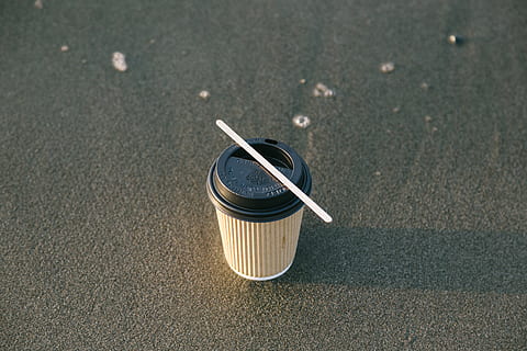black, brown, paper cup, coffee, coffee cup, colors, container, daytime, landscape, plastic cup, sand, seashore, shadow, stick, day, no people, high angle view, single object, still life, focus on foreground, close-up, outdoors, sunlight, man made, road, man made object, drink, glass - material, nature, technology, food and drink, equipment, can, 5K, CC0, public domain, royalty free
