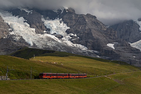 red, train, mountain, outdoors, glacier, ice, nature, snow, landscape, switzerland, grass, field, grassland, vehicle, transportation, scenery, swiss, transport, explore, green, travel, mountain range, scenics - nature, cold temperature, beauty in nature, environment, cloud - sky, mode of transportation, sky, snowcapped mountain, no people, non-urban scene, winter, day, formation, mountain peak, 4K, CC0, public domain, royalty free