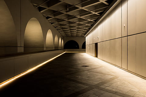 white, painted, wall building, arches, architecture, ceiling, empty, hallway, indoors, inside, interior, modern, passage, urban, direction, the way forward, built structure, arch, diminishing perspective, arcade, building, illuminated, corridor, no people, footpath, day, lighting equipment, absence, transportation, tunnel, light, long, 5K, CC0, public domain, royalty free