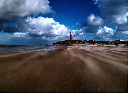 red, lighthouse, cliff, beach, sky, cloud - sky, land, sea, water, built structure, architecture, sand, building exterior, travel destinations, tower, scenics - nature, guidance, nature, building, cloudscape, coastline, no people, outdoors, 4K, CC0, public domain, royalty free