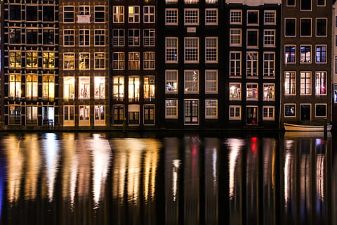 canals in amsterdam, city and Urban, amsterdam, buildings, hD Wallpaper, holland, night, reflection, reflections, bookshelf, book, shelf, publication, library, education, no people, architecture, abundance, indoors, large group of objects, full frame, learning, backgrounds, window, in a row, building, literature, luxury, 4K, CC0, public domain, royalty free