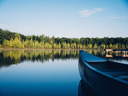 canoe, lake, water, reflection, trees, forest, outdoors, nature, landscape, cottage, rural, blue, sky, summer, tree, nautical vessel, plant, scenics - nature, tranquility, beauty in nature, transportation, tranquil scene, no people, mode of transportation, day, non-urban scene, woodland, rowboat, 4K, CC0, public domain, royalty free