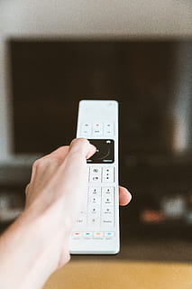white, black, remote, control, hand, portable, remote control, human hand, one person, human body part, technology, holding, real people, communication, lifestyles, wireless technology, portable information device, smart phone, indoors, leisure activity, screen, close-up, connection, touch screen, finger, 5K, CC0, public domain, royalty free