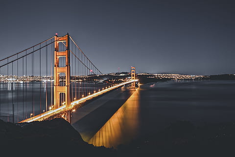 architecture, building, infrastructure, structure, bridge, night, urban, city, dark, lights, bridge - man made structure, built structure, connection, transportation, suspension bridge, sky, water, travel destinations, illuminated, travel, nature, tourism, building exterior, engineering, cityscape, bay, outdoors, office building exterior, 5K, CC0, public domain, royalty free