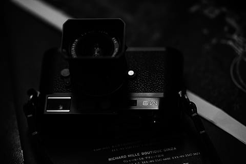 black camera, electronics, camera, digital camera, video camera, adapter, webcam, projector, screen, speaker, audio speaker, stereo, amplifier, lens cap, logo, trademark, symbol, phone, text, document, camera lens, technology, photography themes, camera - photographic equipment, communication, photographic equipment, focus on foreground, western script, photographing, close-up, retro styled, activity, analog, no people, modern, vintage, indoors, antique, slr camera, 4K, CC0, public domain, royalty free