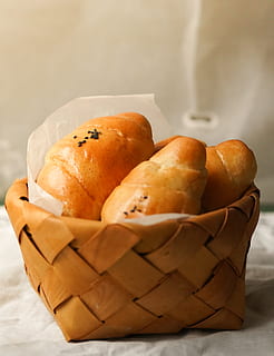 baked, bread, served, basket, bakery, baking, bun, close-up, croissant, delicious, food, homemade, nutrition, pastry, tasty, wheat, food and drink, freshness, container, indoors, focus on foreground, no people, still life, paper, studio shot, table, healthy eating, group of objects, brown, ready-to-eat, wellbeing, 2K, CC0, public domain, royalty free