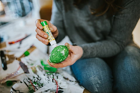 thread, jar, paintbrush, white, yarn, painting, paint, cord, diy, one person, holding, midsection, adult, hand, human hand, human body part, focus on foreground, women, green color, food, indoors, food and drink, sitting, creativity, casual clothing, leisure activity, front view, art and craft, jeans, 4K, CC0, public domain, royalty free