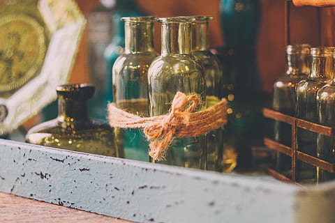drinks, beverage, restaurant, table, yarn, glass, glass - material, transparent, container, indoors, selective focus, no people, bottle, still life, close-up, jar, wood - material, food and drink, reflection, business, store, day, representation, 5K, CC0, public domain, royalty free