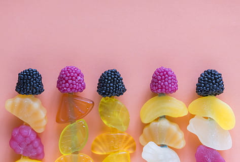 assorted-color fruit decors, assorted, assortment, background, berry, bright, candies, candy, chewy, color, colorful, colourful, confection, delicious, flat lay, flavor, food, fruits, gelatin, gummy, jelly, pink background, skewer, snack, stick, sugar, sugar candy, sweets, taste, tasty, texture, treat, variety, yummy, food and drink, multi colored, sweet food, sweet, freshness, indulgence, studio shot, large group of objects, variation, choice, still life, indoors, berry fruit, no people, healthy eating, fruit, blackberry - fruit, close-up, temptation, 1080P, CC0, public domain, royalty free