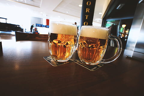 two, glasses, beer, wooden, table, food and drink, refreshment, drink, still life, indoors, glass, freshness, drinking glass, household equipment, alcohol, beer glass, frothy drink, focus on foreground, glass - material, beer - alcohol, bar - drink establishment, mug, restaurant, no people, bar counter, tray, craft beer, 2K, CC0, public domain, royalty free