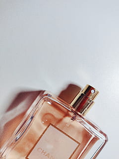 close-up photo, perfume bottle, bottle, container, fragrant, liquid, perfume, scent, spray, indoors, close-up, still life, no people, table, glass - material, copy space, white background, metal, musical instrument, music, wall - building feature, single object, transparent, high angle view, musical equipment, studio shot, two objects, household equipment, 4K, CC0, public domain, royalty free