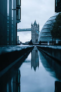 architecture, building, infrastructure, tower, bridge, people, walking, men, city, water, reflection, built structure, building exterior, sky, travel destinations, tourism, travel, waterfront, river, nature, bridge - man made structure, connection, no people, outdoors, office building exterior, skyscraper, 4K, CC0, public domain, royalty free