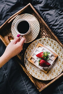 saffle, strawberries, cup, coffee, fruit, cafe, bed, sugar, tray, powder, strawberry, waffle, black coffee, wooden tray, golden plate, vola art of deco, vola, food and drink, human hand, one person, food, berry fruit, sweet food, holding, hand, real people, sweet, dessert, plate, freshness, healthy eating, human body part, indulgence, temptation, 4K, CC0, public domain, royalty free