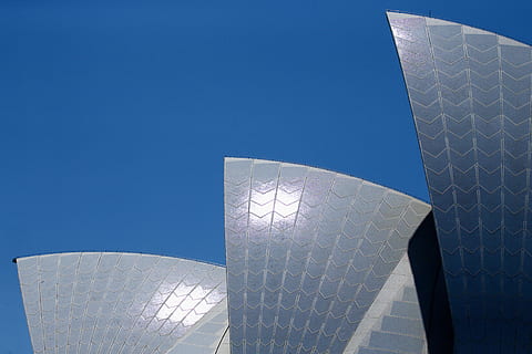 gray painted building, building, architecture, office building, planetarium, convention center, town, city, urban, high rise, observatory, opera house, dome, triangle, tower, metropolis, window, control tower, column, pillar, skyscraper, blue, sky, built structure, clear sky, building exterior, modern, travel destinations, no people, nature, arts culture and entertainment, day, copy space, sunlight, outdoors, sunny, office building exterior, 4K, CC0, public domain, royalty free