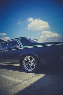 black, vehicle, grey, road close-up photography, car, chrome, classic, oldtimer, retro, vintage, wheel, transportation, mode of transportation, cloud - sky, land vehicle, motor vehicle, sky, sunlight, nature, day, blue, no people, stationary, vintage car, retro styled, road, outdoors, travel, tire, 4K, CC0, public domain, royalty free
