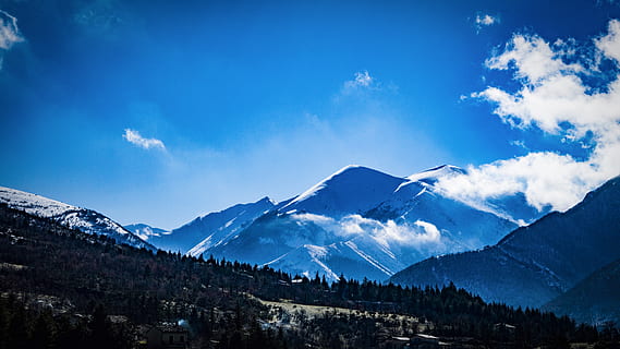 photo, trees, mountains, clouds, cold, daylight, high, ice, landscape, mountain peak, mountain range, scenic, snow, winter, woods, mountain, sky, cold temperature, scenics - nature, cloud - sky, beauty in nature, environment, blue, nature, tree, land, tranquil scene, snowcapped mountain, plant, tranquility, no people, outdoors, pine tree, coniferous tree, mountain ridge, 5K, CC0, public domain, royalty free