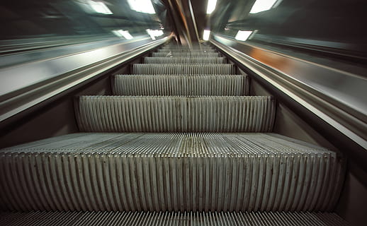 escalataor, automatic stairway, train station, escalator, transportation, architecture, staircase, convenience, indoors, modern, subway station, futuristic, technology, motion, railing, steps and staircases, no people, illuminated, on the move, connection, metal, the way forward, moving walkway, silver colored, subway train, 5K