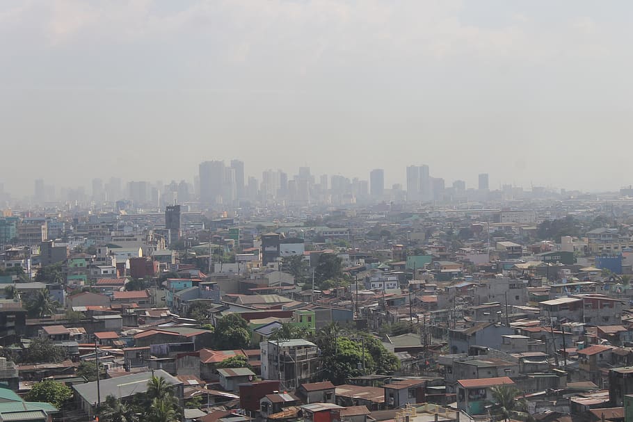 Filipines, caloocan, exterior de l'edifici, arquitectura, estructura construïda, ciutat, paisatge urbà, edifici, barri residencial, cel, multitud, naturalesa, ple de gent, a l'aire lliure, paisatge, vista d’angle alt, gratacels, exterior d’edifici d’oficines, boira, comunitat, dia, modern, lloc, 4K