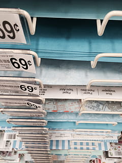 perspective, down, pattern, repeat, repetitive, shadow, art supplies, dollar, pay, artist, white, green, organize, shelf, art, shopping, store, price, money, for sale, text, communication, no people, number, western script, close-up, stack, still life, indoors, day, architecture, low angle view, selective focus, information, education, built structure, focus on foreground, large group of objects, arrangement, 2K, CC0, public domain, royalty free