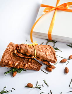 chocolate, plant, food, meal, vegetable, nut, sweets, confectionery, dinner, supper, gift, almond, dessert, dish, roast, culinary, walnut, bread, blossom, flower, food and drink, still life, indoors, ready-to-eat, freshness, close-up, no people, table, white background, brown, studio shot, plate, indulgence, spice, meat, focus on foreground, serving size, healthy eating, wellbeing, temptation, snack, 4K, CC0, public domain, royalty free